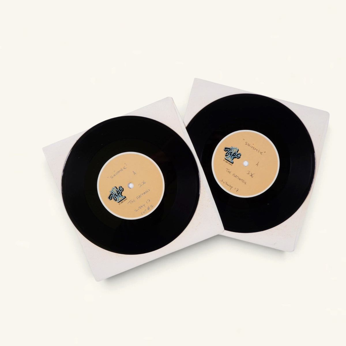 The Flatmates - ‘Shimmer’ 7-Inch Acetates x2 (Tape One) + Sealed ‘Shimmer’ 7-Inch with Badge