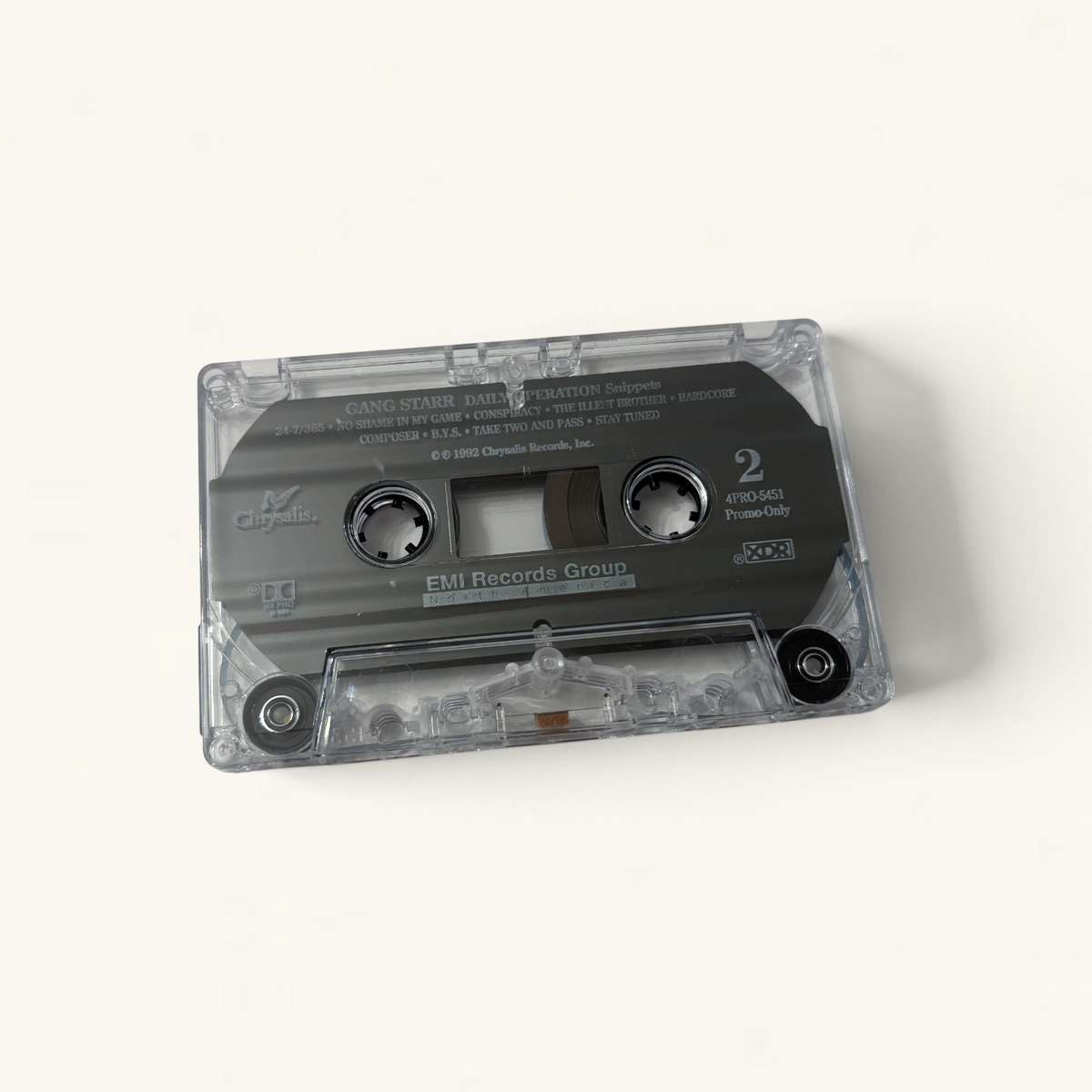 Wax Poetics Gang Starr Daily Operation promotional cassette tape with clear plastic shell and grey label
